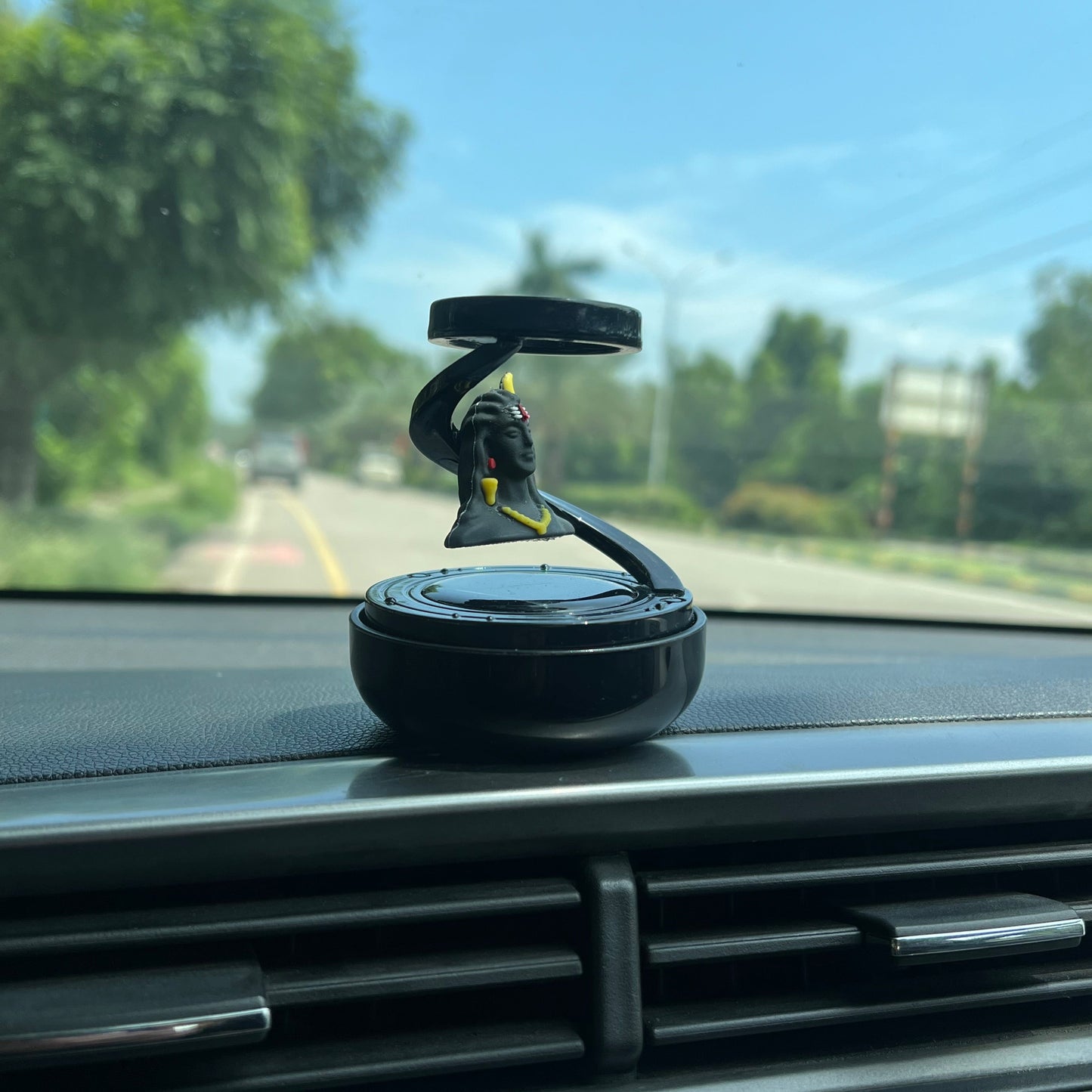 Solar-Powered Floating Shiv Idol with Car Fragrance